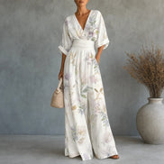 Floral Print Wide-Leg Jumpsuit with Tie Waist and Pockets