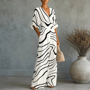 Floral Print Wide-Leg Jumpsuit with Tie Waist and Pockets