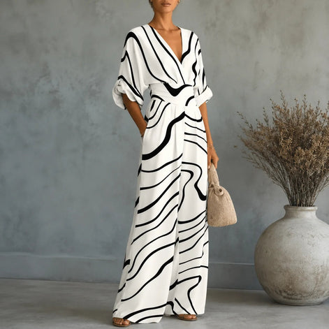 Floral Print Wide-Leg Jumpsuit with Tie Waist and Pockets