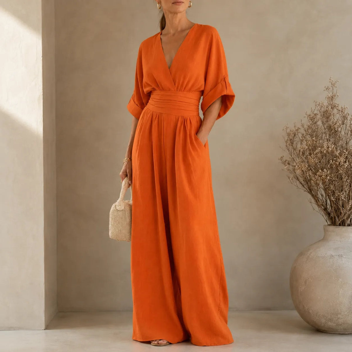 V-Neck Wide-Leg Jumpsuit with Pleated Waist Sash