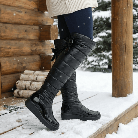 Velura Women's Black Fleece-Lined Quilted Puffer Over-the-Knee Boots with Bow Detail