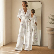Floral Print Wide-Leg Jumpsuit with Tie Waist and Pockets